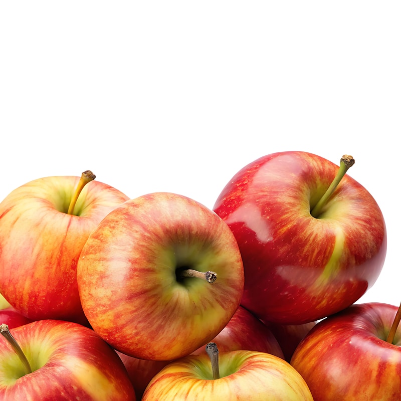Gros plan de pommes rouges et jaunes, fraîches et brillantes, empilées sur un fond blanc avec un espace vide en haut.